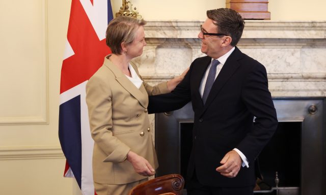 Prime Minister Andy Burnham and Health Secretary Yvette Cooper talking together in Downing Street