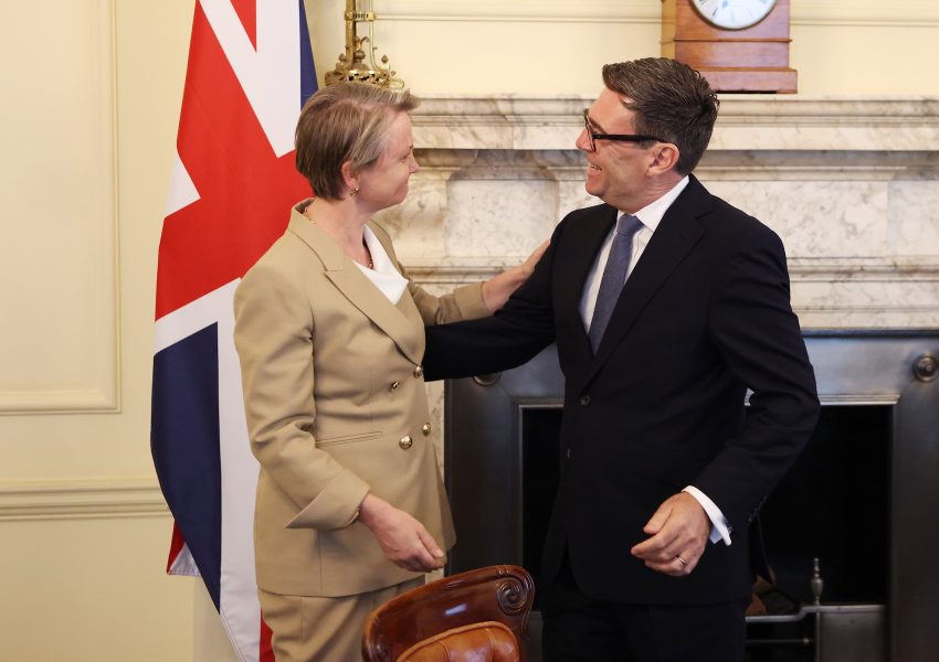 Prime Minister Andy Burnham and Health Secretary Yvette Cooper talking together in Downing Street